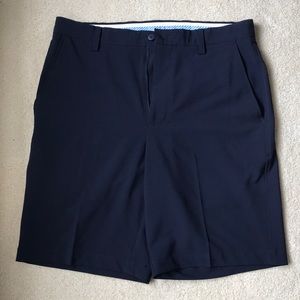 Men’s navy Footjoy golf shorts. Size W34.